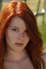 Lovely Redhead Mia Sollis Posing Outdoor-11