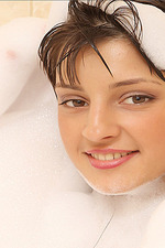 Teen girl takes a foam bath-06