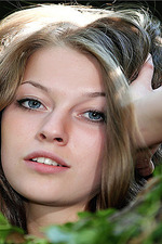 Innocent teen brunette posing in the forest-03