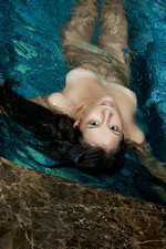 Naked teen girl having fun by the pool-03