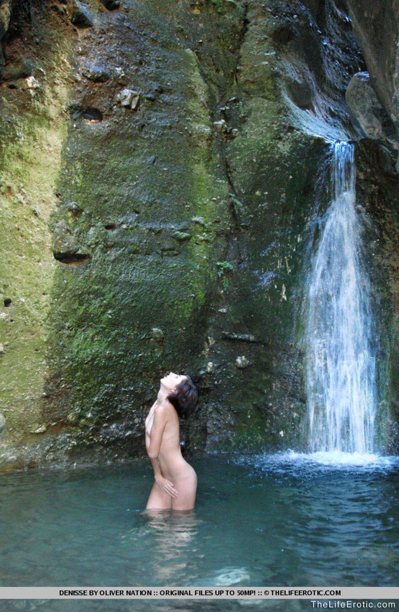 Naked babe by the waterfall-14