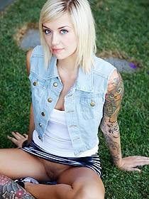 Tattooed teen without panties