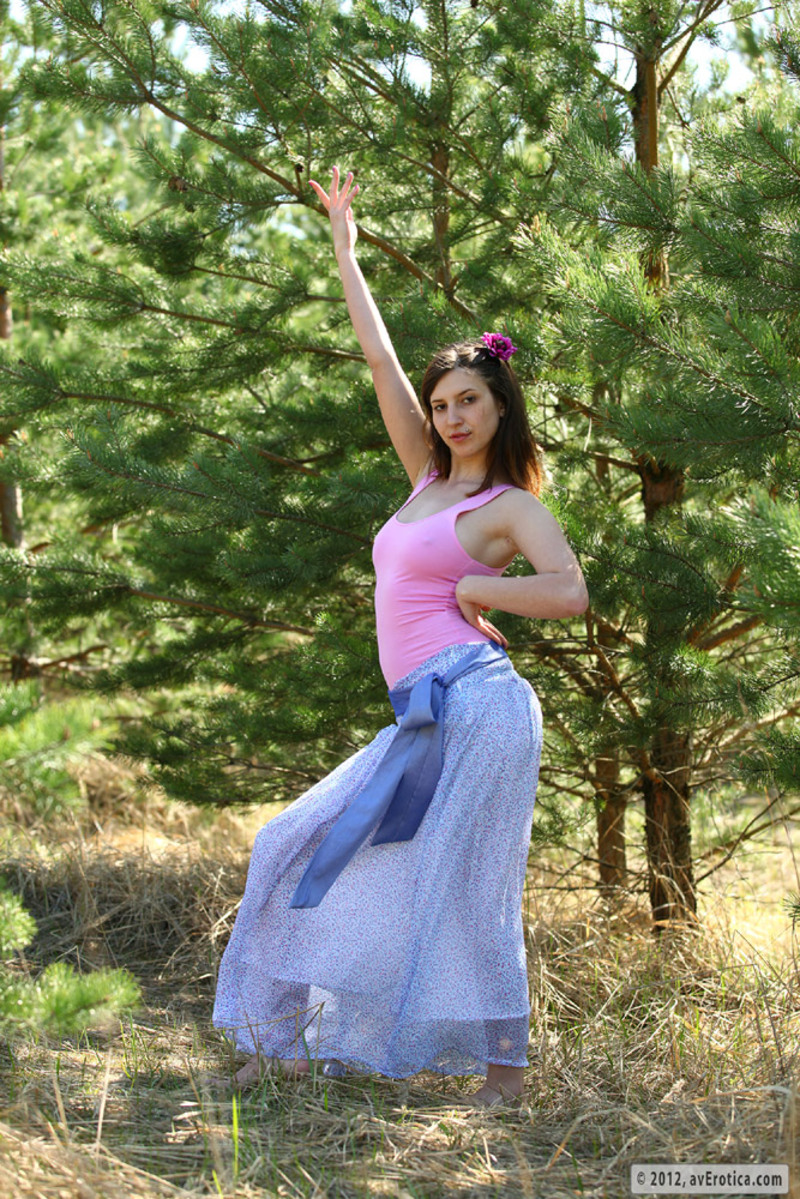 Naked teen with big boobs posing outdoors-00