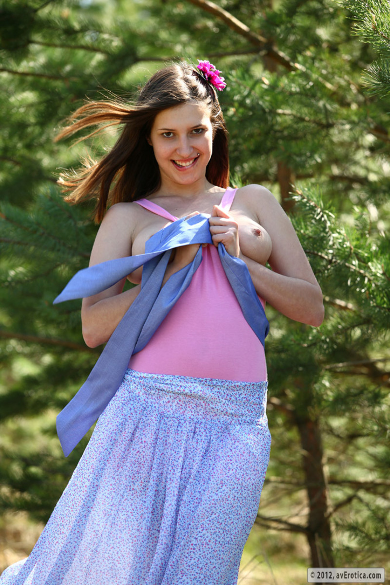 Naked teen with big boobs posing outdoors-05