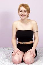 Busty redhead teen gets naked-00