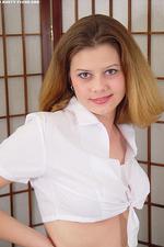 Busty teen takes off her schoolgirl uniform-00