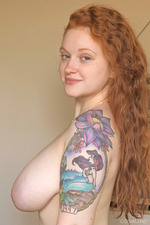 Ginger Tattooed Chick Shows Her Huge Tits-12