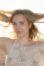 Cute Blonde Ranova Is Naked In The Sand-06