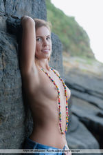 Naked Brunette Teen Posing On The Rocks-02
