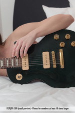 Naked Lovely Caprice Posing With A Guitar-08
