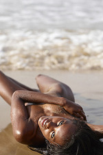 Naked ebony babe posing by the sea-07