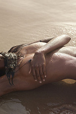 Naked ebony babe posing by the sea-09