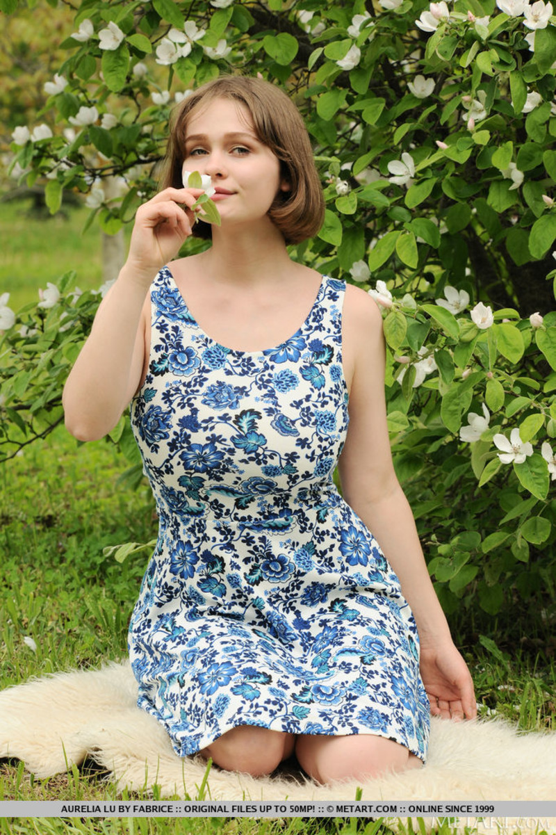 Busty Aurelia Lu Undressing Outdoors-09