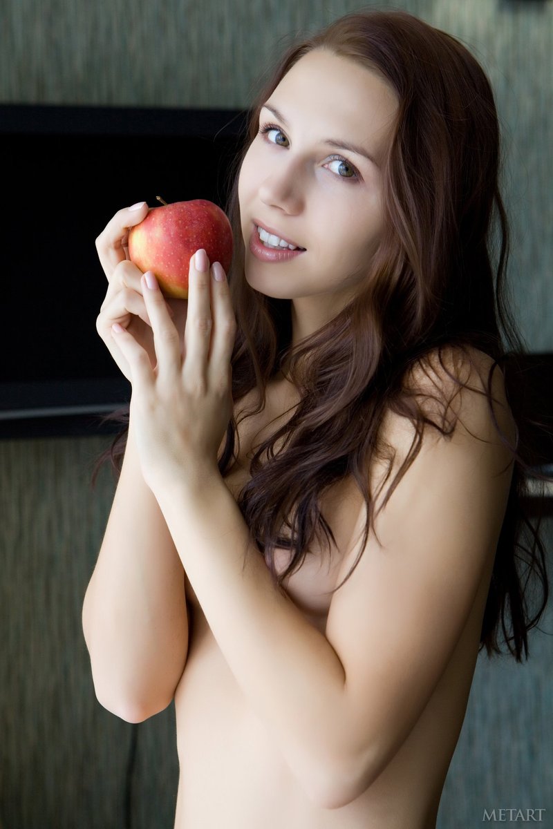 Naked redhead with her favorite fruit-17