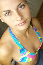 Coed girl taking off her sexy bikini-00