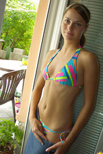Coed girl taking off her sexy bikini-11