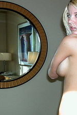 Creamy Veronica naked and spreading in bed-09