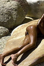 Naomi with her perfect ebony skin enjoys a little nude sun bathing on a hot summer day-06