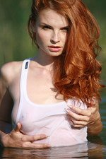 Redhead babe gets nude and wet in the river-01