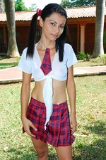 Nakedness in the garden with a cute teen latina-00