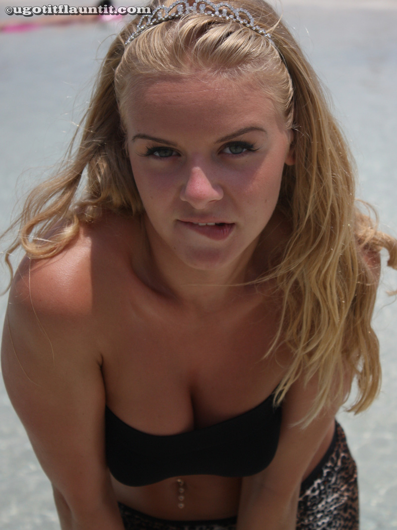 Busty blondie at the beach-01