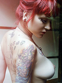 Wild tattooed busty girl