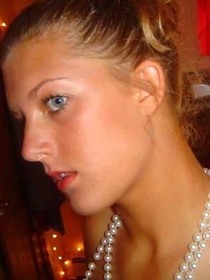 Sexy blue eyed chick displays her tits on cam